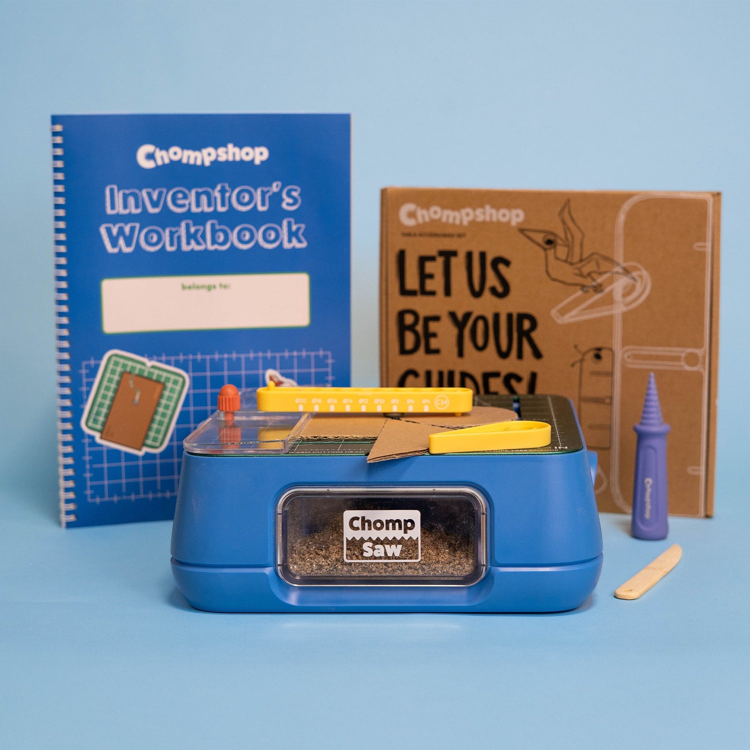 ChompSaw and accessories displayed on a blue background to show the components of a Maker Bundle.