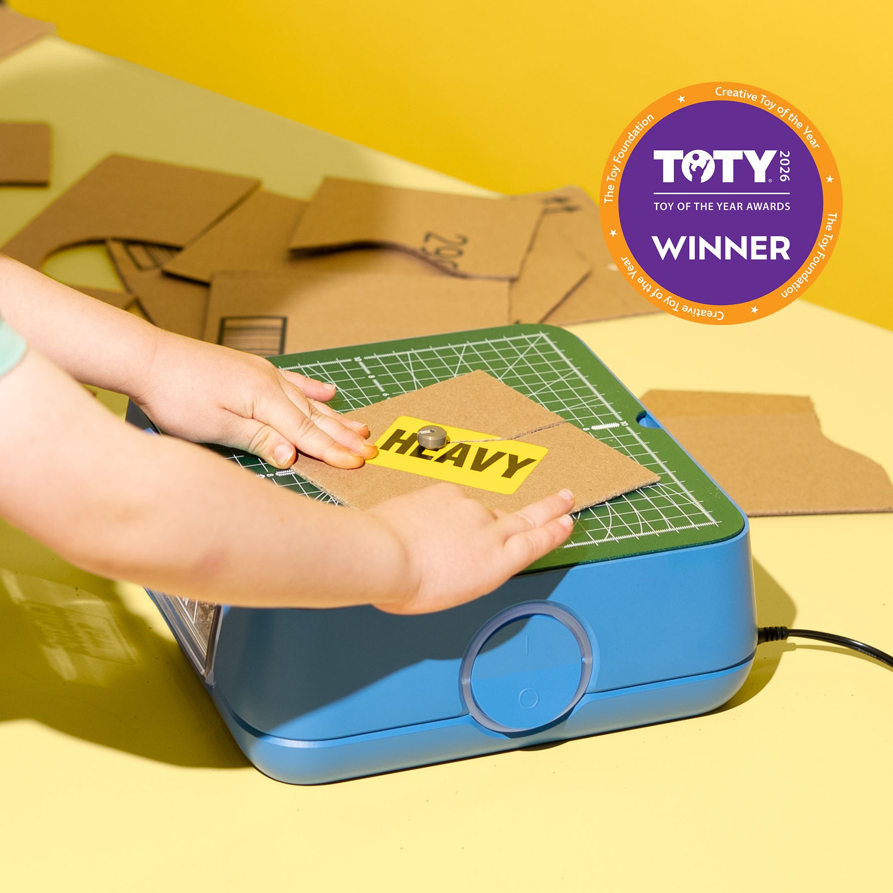 Child using the ChompSaw kids power tool, winner of the 2026 TOTY Creative Toy of the Year Award.