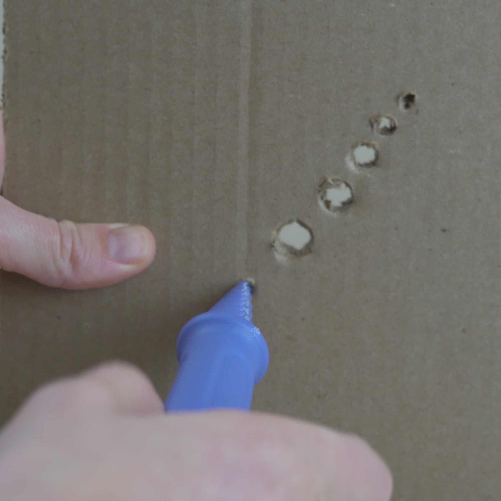 Cardboard Hole Punch Tool